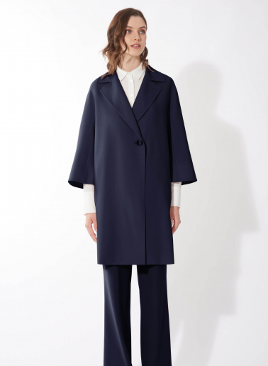 Assymetrical blue overcoat in comfort wool