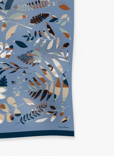 Light blue wool scarf with stylized leaves