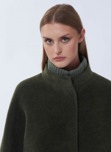 Short oversized green alpaca and wool coat with knitted details