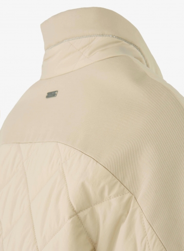 Giacca beige trapuntata in tessuto tecnico con dettagli lurex