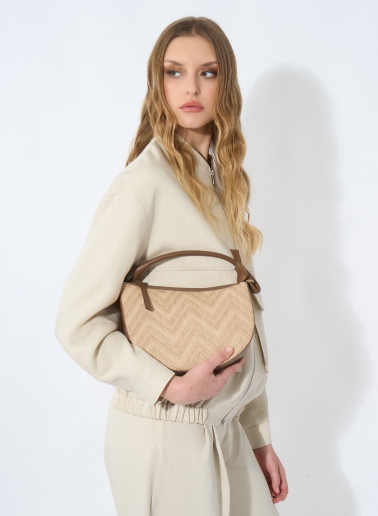 Asymmetrical straw bag with tobacco colour leather details