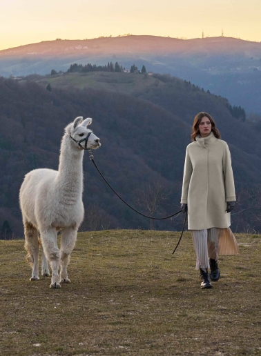Beige pure zibeline wool coat with knitted inserts