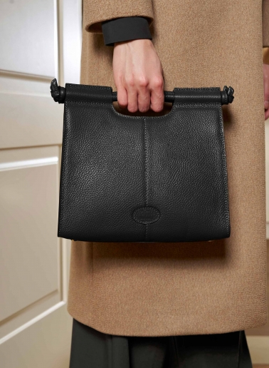 Black leather handbag with strap