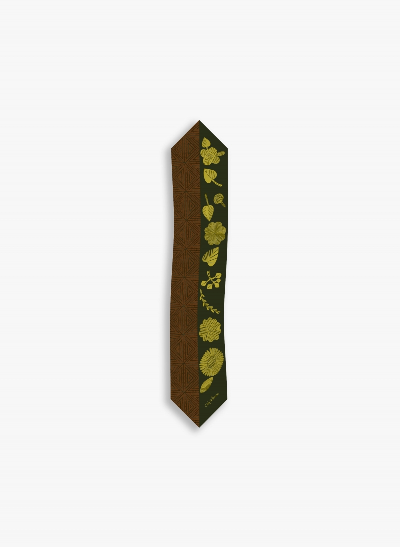 Green twill silk headband with geometric pattern and leaves