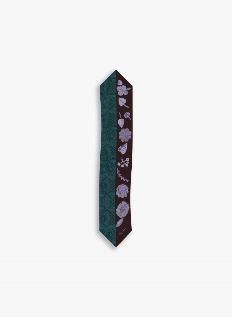 Burgundy twill silk headband with geometric pattern and leaves