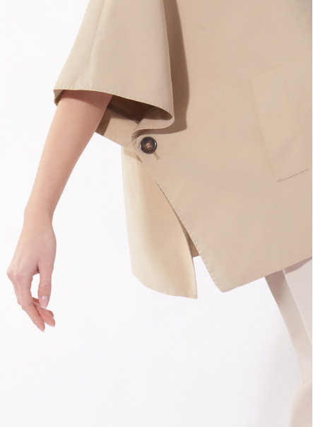 Double breasted beige cape in rainproof technical fabric