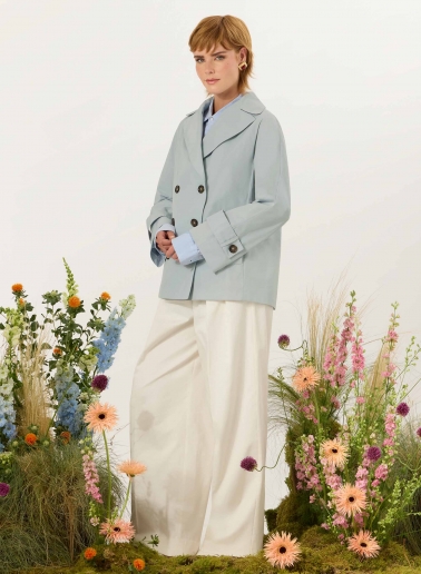 Double breasted light blue jacket with maxi notch collar in rainproof technical fabric