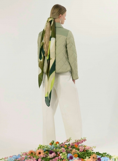 Military green quilted jacket with shirt collar and contrasting details