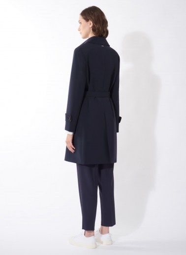Double breasted dark blue trench coat in technical fabric