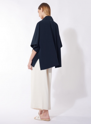 Double breasted blue cape in rainproof technical fabric