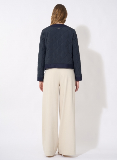 Dark blue quilted jacket with pure wool edges