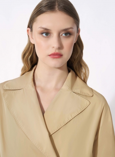 Double breasted beige jacket with maxi notch collar in rainproof technical fabric