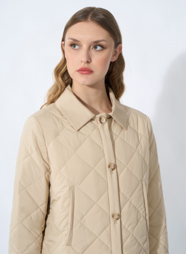 Steppjacke mit Hemdkragen und kontrastierenden Details in Beige