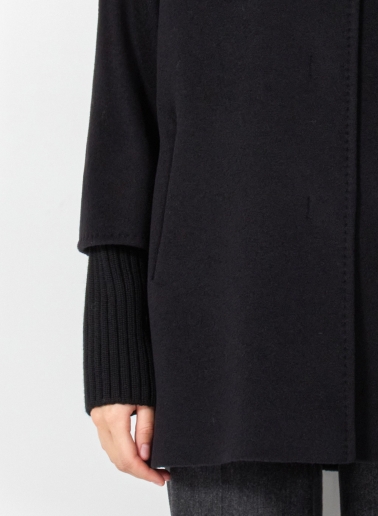 Short oversized black pure wool coat with knitted details