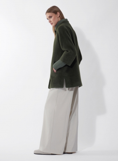 Short oversized green alpaca and wool coat with knitted details
