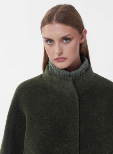 Short oversized green alpaca and wool coat with knitted details