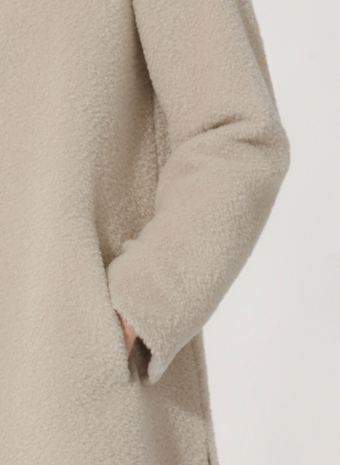 Short flared beige wool and alpaca coat with side vents