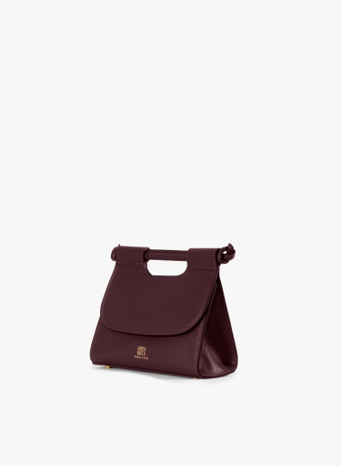 Burgundy leather shoulder bag with integrated handle and strap