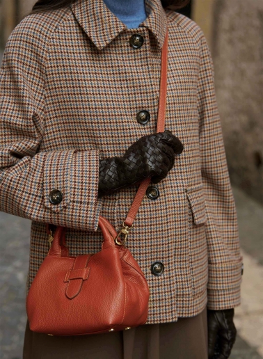 Terracotta colour genuine leather mini handbag with strap