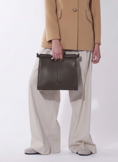Brown leather handbag with strap
