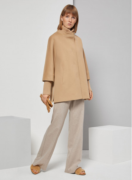 Short camel wool coat with knit details
