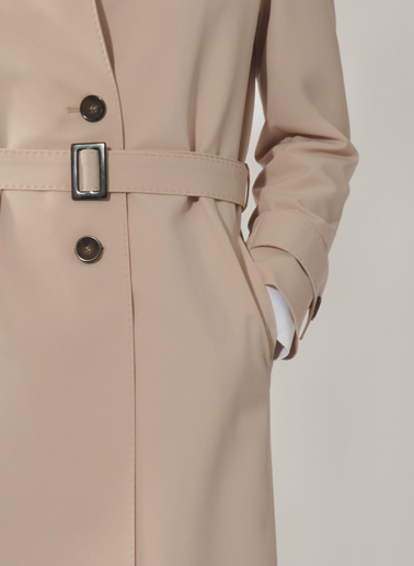 Trench monopetto beige in tessuto tecnico con impunture sartoriali