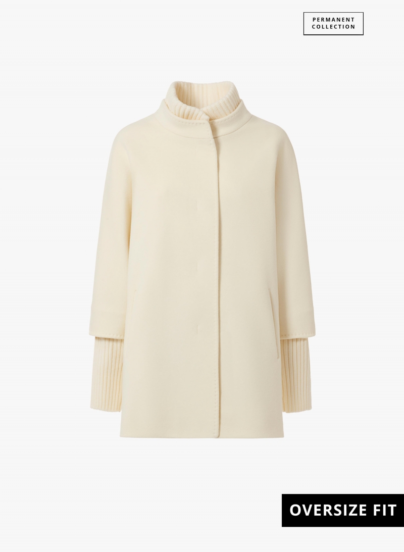 Short oversized white pure wool coat with knitted details