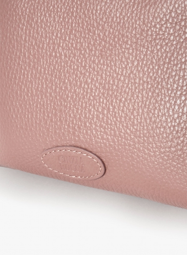 Pink genuine leather crossbody bag with three compartments