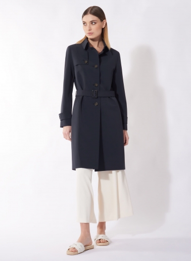Single breasted blue trench coat in technical fabric with hand stitches