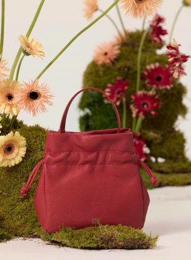 Red small bucket bag with handle and strap