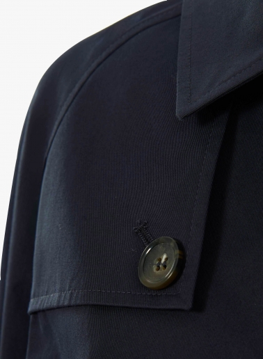 Giacca blu scuro in cotone con collo a camicia e patta stile trench