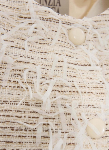 Giacca beige con frange