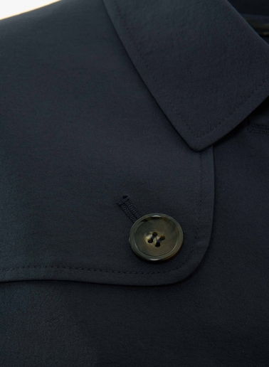 Dark blue overcoat in rainproof technical fabric with trench-style flap