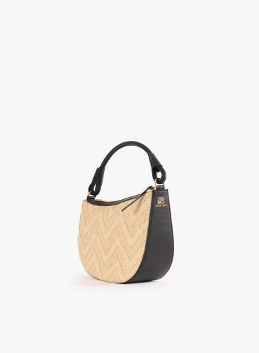 Asymmetrical straw bag with black leather details