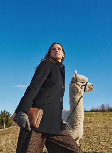 Tobacco color genuine leather crossbody bag with three compartments