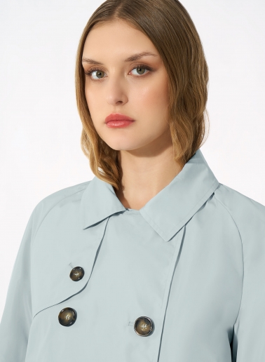 Double breasted light blue jacket in rainproof technical fabric