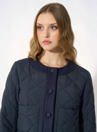 Dark blue quilted jacket with pure wool edges