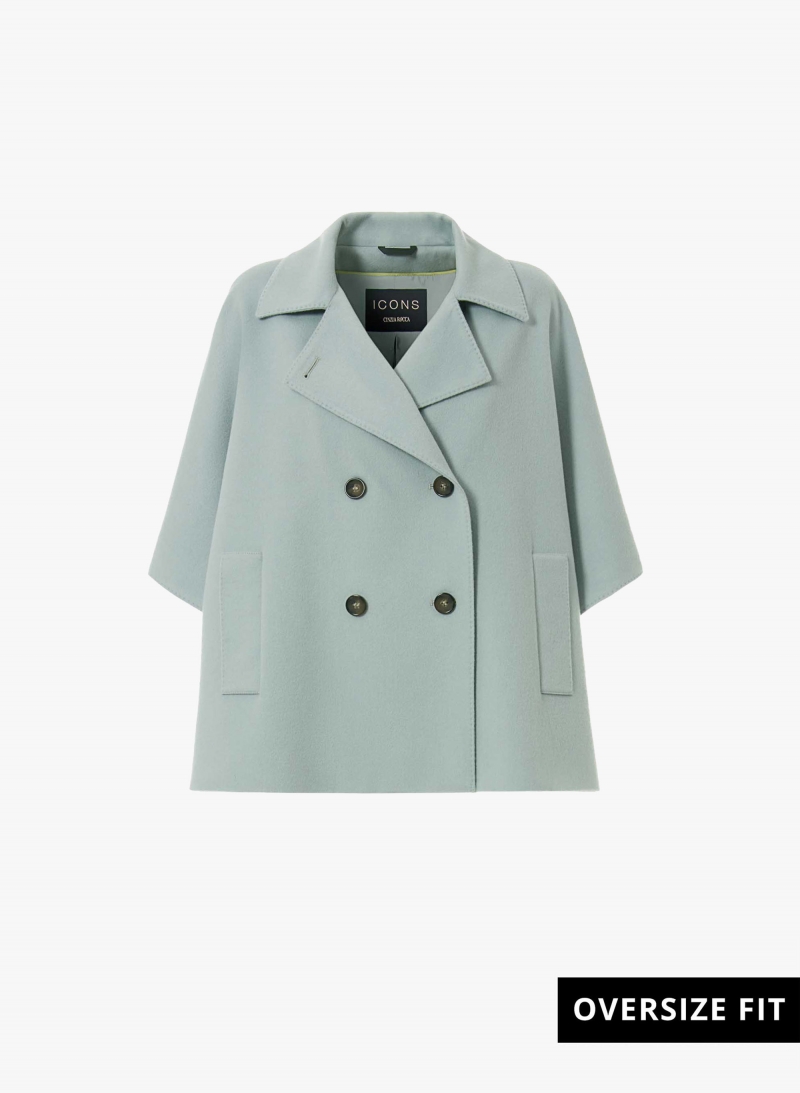Double breasted light blue cape in pure wool