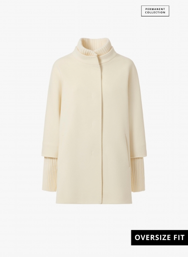 Short oversized white pure wool coat with knitted details