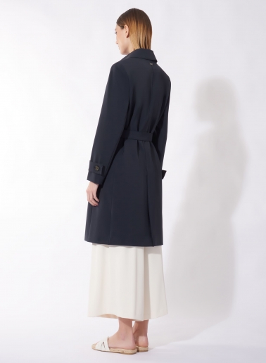 Single breasted blue trench coat in technical fabric with hand stitches