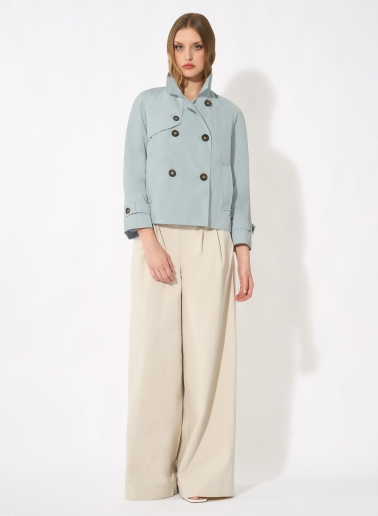 Double breasted light blue jacket in rainproof technical fabric
