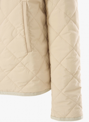 Beige quilted jacket with shirt collar and contrasting details