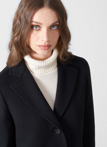 Straight black wool and cashmere coat with masculine cut