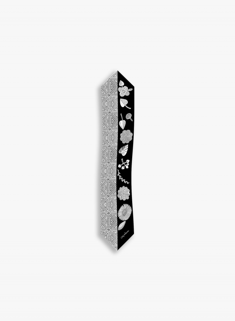 Black twill silk headband with geometric pattern and leaves