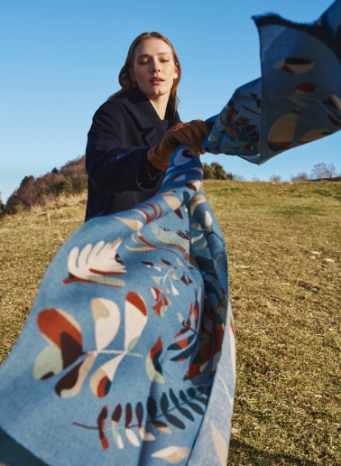 Light blue wool scarf with stylized leaves