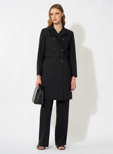 Double-breasted black trench coat in technical fabric with tailored stitches