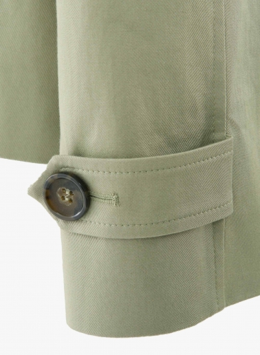 Military green cotton jacket with shirt collar and trench-style flap