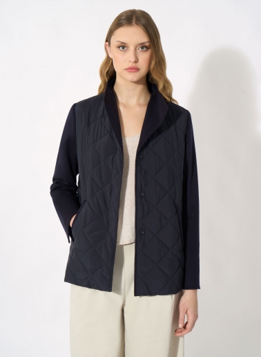 Dark blue quilted jacket with contrasting wool sleeves
