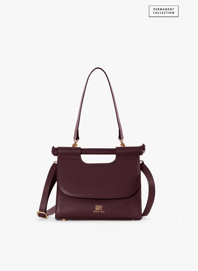 Burgundy leather shoulder bag with integrated handle and strap