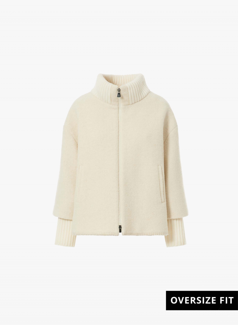 Short oversized bianco coat with knitted inserts